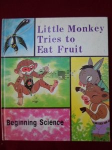 Little monkey ries to eat fruit / Maimutica incearca sa manance fructe